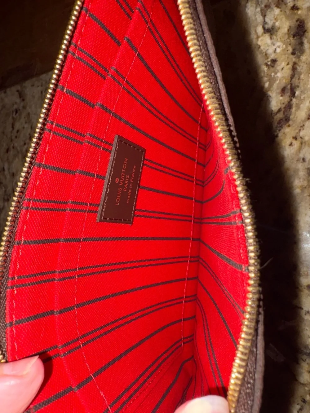 Louis Vuitton neverfull wristlet